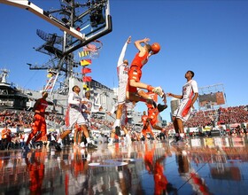 AGAINST THE WIND: SU overcomes weather to get win in historic season opener aboard USS Midway