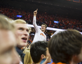 Virginia fans storm court after win, provide raucous playing environment 