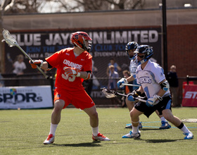 FINDING A WAY: Despite struggling at faceoff X, No. 10 Syracuse inches by No. 3 Johns Hopkins with help from attack