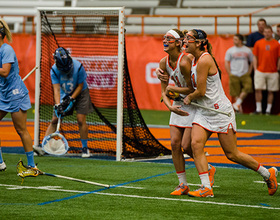 Treanor nets 7 goals as No. 3 Syracuse outlasts No. 1 North Carolina 12-9 