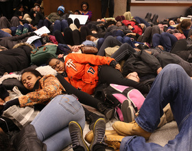 SU community members stage 'die-in' at Bird Library, protest downtown as part of 'March for Justice'