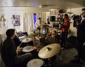 Friends form rock band ‘Pizza Party’ in South Campus apartment