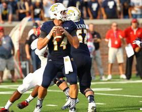 Father-son dynamic between head coach and quarterback propels UTC to success