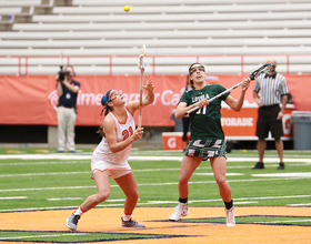 Syracuse women's lacrosse overcomes poor performance at the draw circle to slip past USC, 12-11