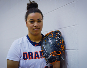 KEEP THE FAITH: Faith Cain lost her ability to throw and a scholarship to the yips. Now, she plays first base at Syracuse.