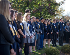 Syracuse University community gathers for emotional Rose Laying Ceremony, concluding Remembrance Week