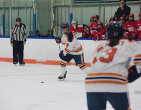 Lauren Bellefontaine on her way to CHA Rookie of the Year