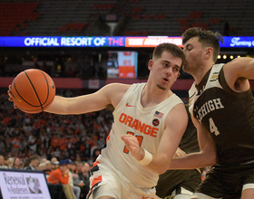 'Determined' Joe Girard wills Syracuse to 70-69 win over Louisville