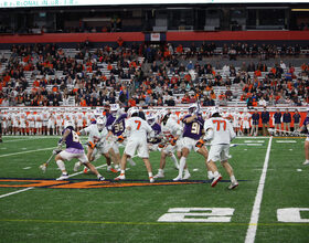 Our beat writers agree on a resounding Syracuse victory over Holy Cross