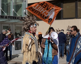 Members, allies of Mohawk Nation protest land settlement talks in downtown Syracuse