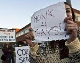 Students protest anti-gay demonstrators on Waverly Avenue