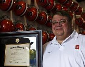 THE 50-YEAR-OLD GRADUATE: Head equipment manager Kyle Fetterly failed out of SU 3 times. In May, he walked with the Class of 2009