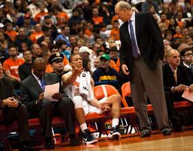 MBB : SU players pay tribute to Fine with empty seat on bench during win over Colgate