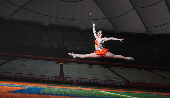 Meghan Sinisi: The Orange Girl embodies SU spirit by supporting teams with baton twirling