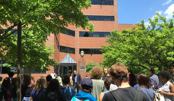 Syracuse University community members protest University Place promenade