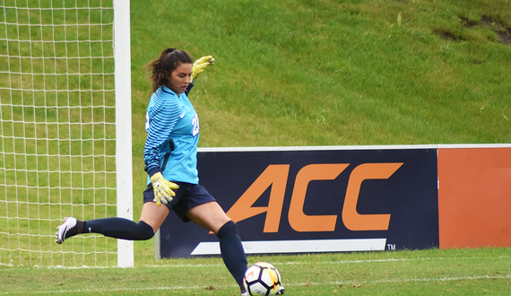 Freshman Lysianne Proulx readies herself for a shot in goal