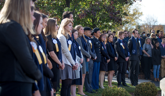 Syracuse University community gathers for emotional Rose Laying Ceremony, concluding Remembrance Week