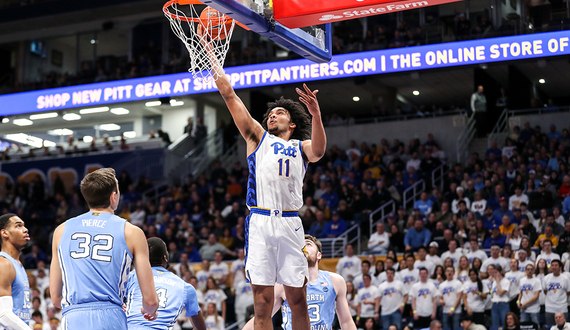 Justin Champagnie leads Pitt in scoring and rebounding as a freshman