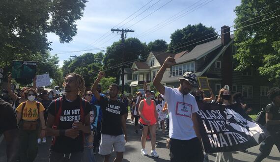 Last Chance for Change demonstrators march through SU campus