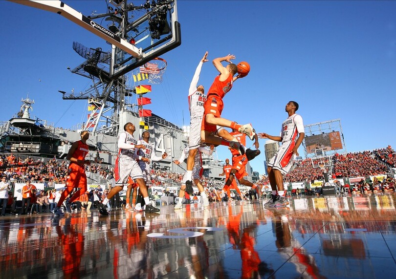 AGAINST THE WIND: SU overcomes weather to get win in historic season opener aboard USS Midway