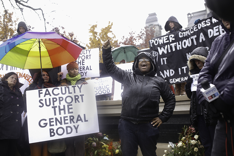 Syracuse University community members rally outside Hall of Languages to support sit-in