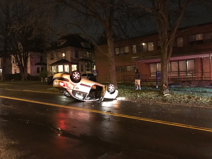 Driver arrested for possible DWI after flipping car upside down near Syracuse University campus