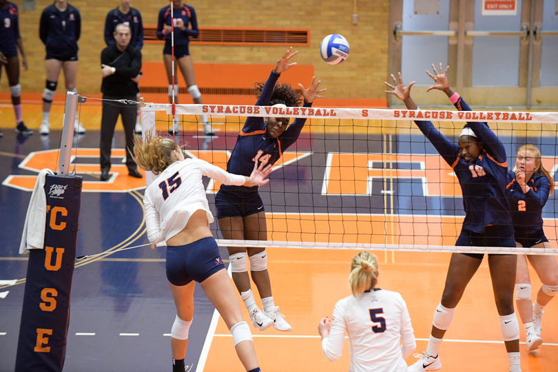 Syracuse&#8217;s defense helps fend off Virginia in straight-set victory