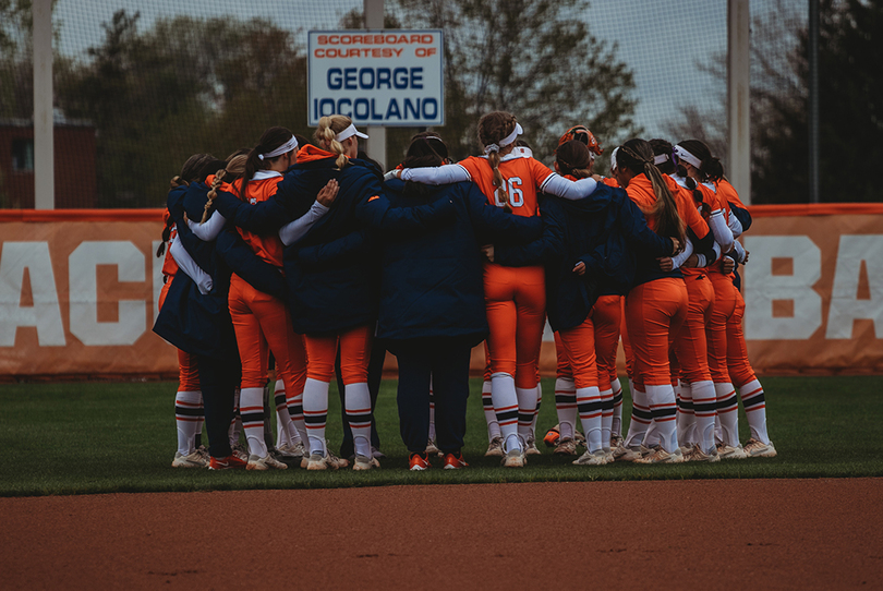 SU softball players defend coach Shannon Doepking