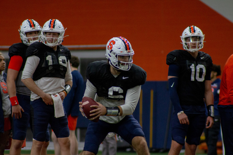 Notebook: Quarterbacks, coaches adjust to new offense in return to practice