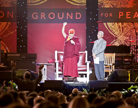 Dalai Lama opens One World Concert with charm, humor