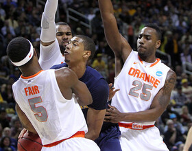 IN A ZONE: Syracuse's vaunted 2-3 lifts Orange past California, into Sweet 16