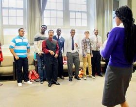 The Black Celestial Choral Ensemble puts in work on stage, in the community