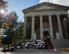 NAACP members stage silent protest outside of SU-sponsored diversity forum