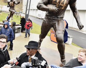 Statues of former SU legends Jim Brown, Floyd Little and Ernie Davis unveiled at new Plaza 44