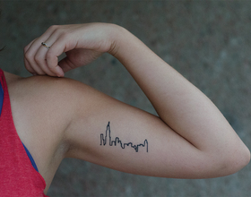 Senior's skyline tattoo reminds her of childhood memories