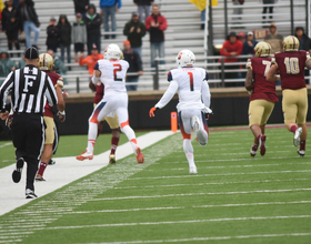 Eric Dungey on sideline scuffle: 'Some guy’s standing over me talking smack and I just try to get him off me'