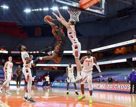 Improved 1st-half defense propels Syracuse to 64-54 win over Clemson