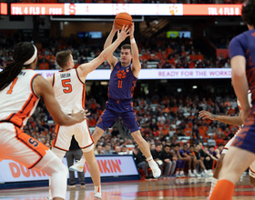 Joe Girard III finishes with a game-high 18 points in return to Syracuse