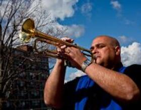 Rhythm in blue: Department of Public Safety Chief Tony Callisto balances on-stage and on-campus duties