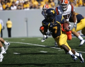 FB :  DEVINE INTERVENTION: Noel Devine's 92-yard, fourth-quarter TD spoils Syracuse's upset hopes at WVU