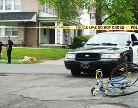 Bike, cop car collide at corner of Euclid, Sumner