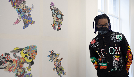 Student displays drawings of superheroes, fictional characters in exhibit