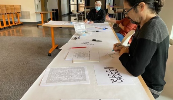 Artist educates city residents about Arabic community with calligraphy workshop