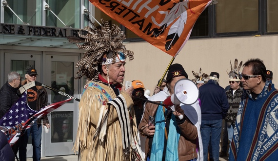 Members, allies of Mohawk Nation protest land settlement talks in downtown Syracuse