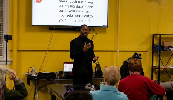 Maurice Brown addresses community housing concerns in town hall