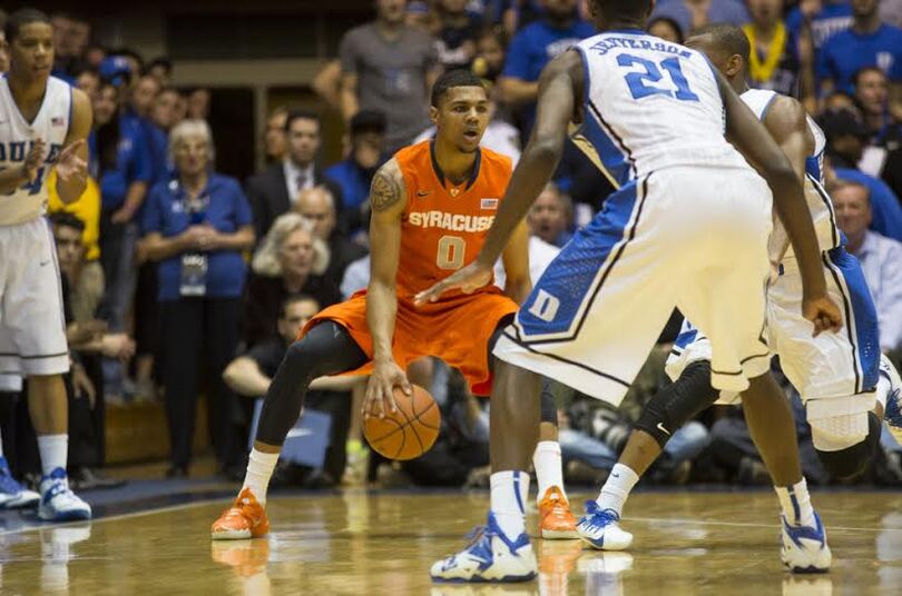 Gbinije contributes off bench in 1st game at former school Duke