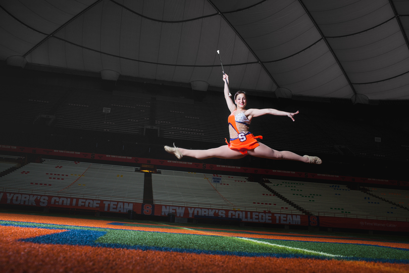 Meghan Sinisi: The Orange Girl embodies SU spirit by supporting teams with baton twirling