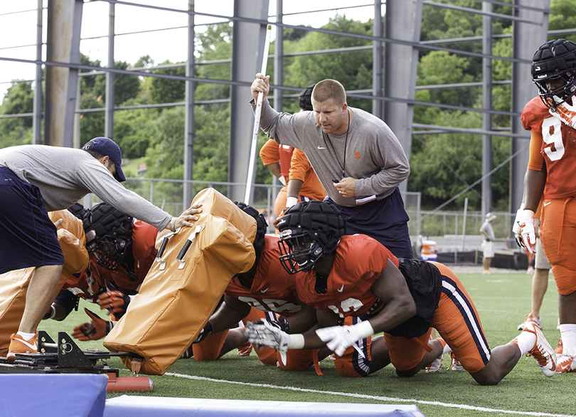 Guardian helmet caps help Syracuse practice more safely in 1st year of use after drawing confused initial reactions