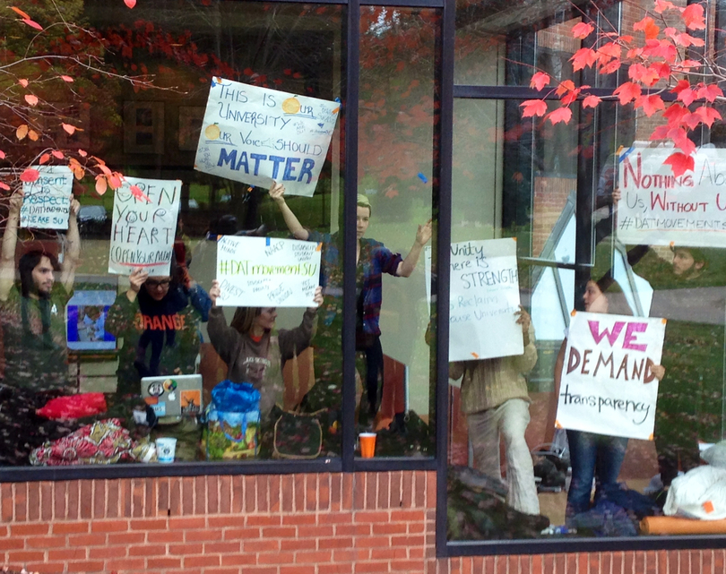 Students, faculty hold rally outside Crouse-Hinds to show support for student protesters staging sit-in