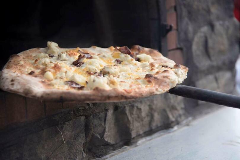 Toss &#8216;n&#8217; Fire Pizza moves authentic food from truck to restaurant